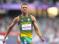 Mpumelelo Mhlongo of South Africa celebrates winning gold in Men's 100m - T44 Final during the Paris 2024 Paralympic Games at Stade de Franc...