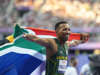 Mpumelelo Mhlongo of South Africa celebrates winning gold in Men's 100m - T44 Final during the Paris 2024 Paralympic Games at Stade de Franc...