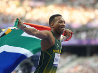 Mpumelelo Mhlongo of South Africa celebrates winning gold in Men's 100m - T44 Final during the Paris 2024 Paralympic Games at Stade de Franc...