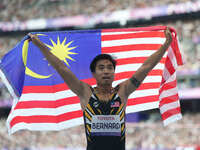 Eddy Bernard of Malaysia celebrates winning bronze in Men's 100m - T44 Final during the Paris 2024 Paralympic Games at Stade de France on Se...