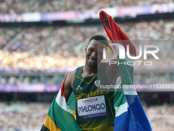 Mpumelelo Mhlongo of South Africa celebrates winning gold in Men's 100m - T44 Final during the Paris 2024 Paralympic Games at Stade de Franc...