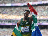 Mpumelelo Mhlongo of South Africa celebrates winning gold in Men's 100m - T44 Final during the Paris 2024 Paralympic Games at Stade de Franc...