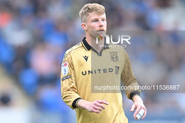 Andy Cannon (8 Wrexham) looks on during the Sky Bet League 1 match between Peterborough and Wrexham at London Road in Peterborough, England,...