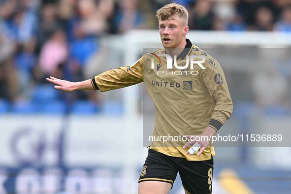 Andy Cannon (8 Wrexham) gestures during the Sky Bet League 1 match between Peterborough and Wrexham at London Road in Peterborough, England,...