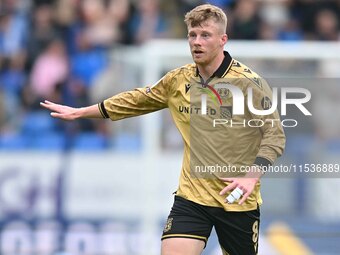 Andy Cannon (8 Wrexham) gestures during the Sky Bet League 1 match between Peterborough and Wrexham at London Road in Peterborough, England,...