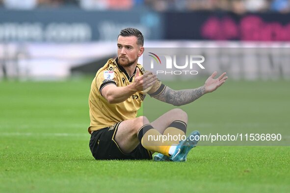 Jack Marriot (11 Wrexham) appeals for a foul during the Sky Bet League 1 match between Peterborough and Wrexham at London Road, Peterborough...