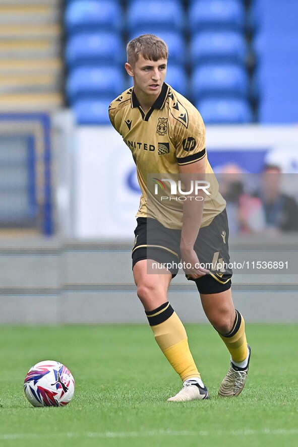 Max Cleworth (4 Wrexham) looks on during the Sky Bet League 1 match between Peterborough and Wrexham at London Road in Peterborough, England...