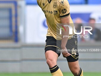 Max Cleworth (4 Wrexham) looks on during the Sky Bet League 1 match between Peterborough and Wrexham at London Road in Peterborough, England...