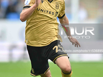 Ryan Barnett (29, Wrexham) controls the ball during the Sky Bet League 1 match between Peterborough and Wrexham in Peterborough, United King...