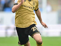 Ryan Barnett (29, Wrexham) controls the ball during the Sky Bet League 1 match between Peterborough and Wrexham in Peterborough, United King...