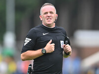 Referee Carl Brook looks on during the Sky Bet League 1 match between Peterborough and Wrexham at London Road in Peterborough, England, on A...