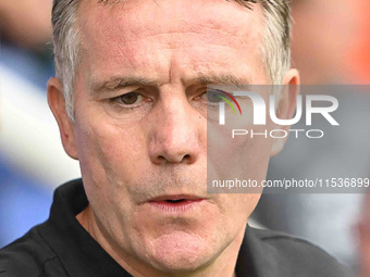 Close-up of Manager Phil Parkinson (Manager Wrexham) during the Sky Bet League 1 match between Peterborough and Wrexham at London Road in Pe...