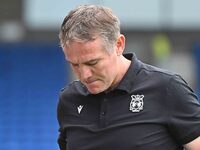 Manager Phil Parkinson looks down during the Sky Bet League 1 match between Peterborough and Wrexham at London Road in Peterborough, England...