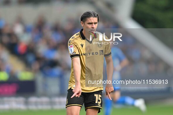 George Dobson (15 Wrexham) gestures during the Sky Bet League 1 match between Peterborough and Wrexham at London Road in Peterborough, Engla...