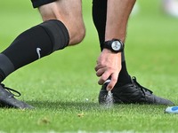 Referee Carl Brook marks the wall during the Sky Bet League 1 match between Peterborough and Wrexham in Peterborough, England, on August 31,...