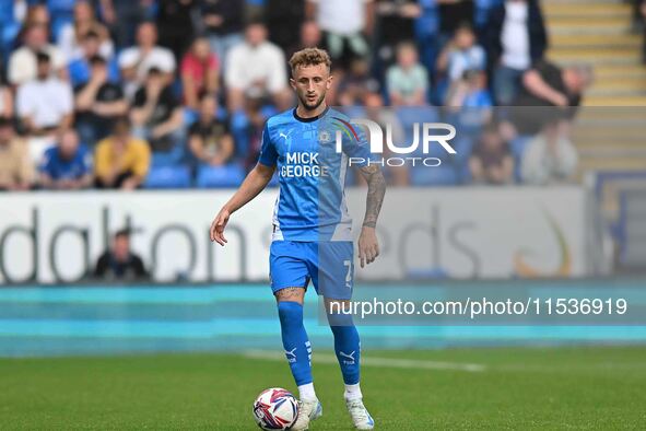 Sam Curtis of Peterborough United controls the ball during the Sky Bet League 1 match between Peterborough and Wrexham in Peterborough, Unit...