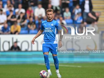 Sam Curtis of Peterborough United controls the ball during the Sky Bet League 1 match between Peterborough and Wrexham in Peterborough, Unit...