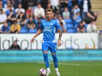 Sam Curtis of Peterborough United controls the ball during the Sky Bet League 1 match between Peterborough and Wrexham in Peterborough, Unit...