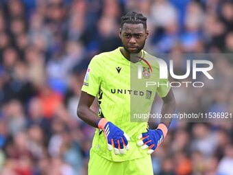 Goalkeeper Arthur Okonkwo (1 Wrexham) looks on during the Sky Bet League 1 match between Peterborough and Wrexham at London Road in Peterbor...