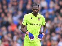 Goalkeeper Arthur Okonkwo (1 Wrexham) looks on during the Sky Bet League 1 match between Peterborough and Wrexham at London Road in Peterbor...