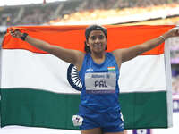 Preethi Pal of India celebrates winning bronze in Women's 200m - T35 Final during the Paris 2024 Paralympic Games at Stade de France on Sept...