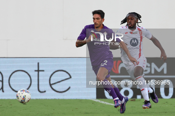 Danilo Cataldi of ACF Fiorentina and Warren Bondo of AC Monza battle for the ball during the Italian Serie A football match between ACF Fior...