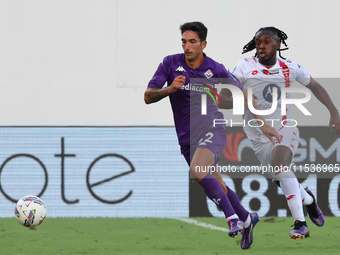 Danilo Cataldi of ACF Fiorentina and Warren Bondo of AC Monza battle for the ball during the Italian Serie A football match between ACF Fior...