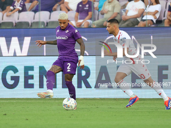 Domilson Cordeiro Dos Santos Dodo of ACF Fiorentina and Gianluca Caprari of AC Monza battle for the ball during the Italian Serie A football...