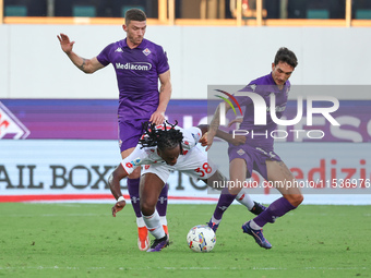 Danilo Cataldi of ACF Fiorentina and Warren Bondo of AC Monza battle for the ball during the Italian Serie A football match between ACF Fior...