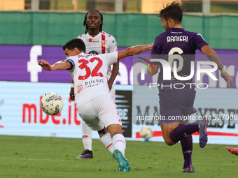 Luca Ranieri of ACF Fiorentina and Matteo Pessina of AC Monza battle for the ball during the Italian Serie A football match between ACF Fior...