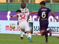 Luca Ranieri of ACF Fiorentina and Matteo Pessina of AC Monza battle for the ball during the Italian Serie A football match between ACF Fior...