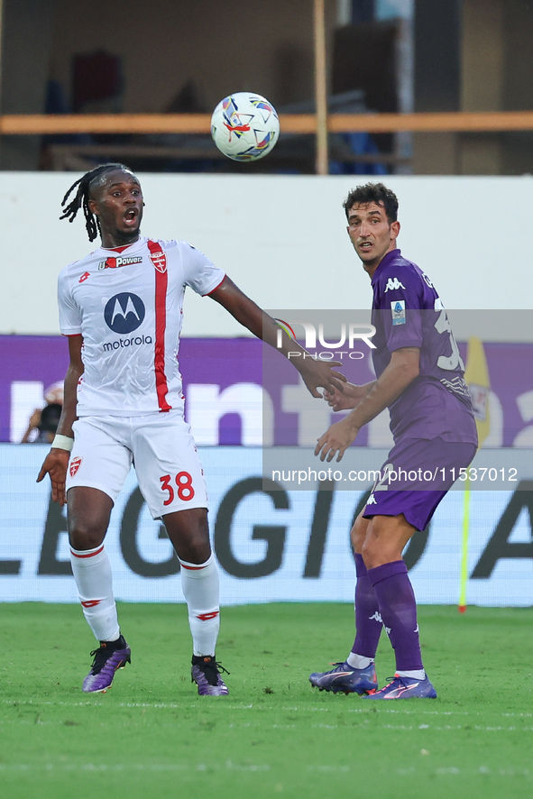 Danilo Cataldi of ACF Fiorentina and Warren Bondo of AC Monza battle for the ball during the Italian Serie A football match between ACF Fior...