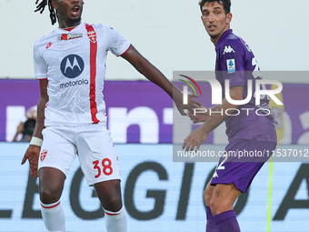 Danilo Cataldi of ACF Fiorentina and Warren Bondo of AC Monza battle for the ball during the Italian Serie A football match between ACF Fior...