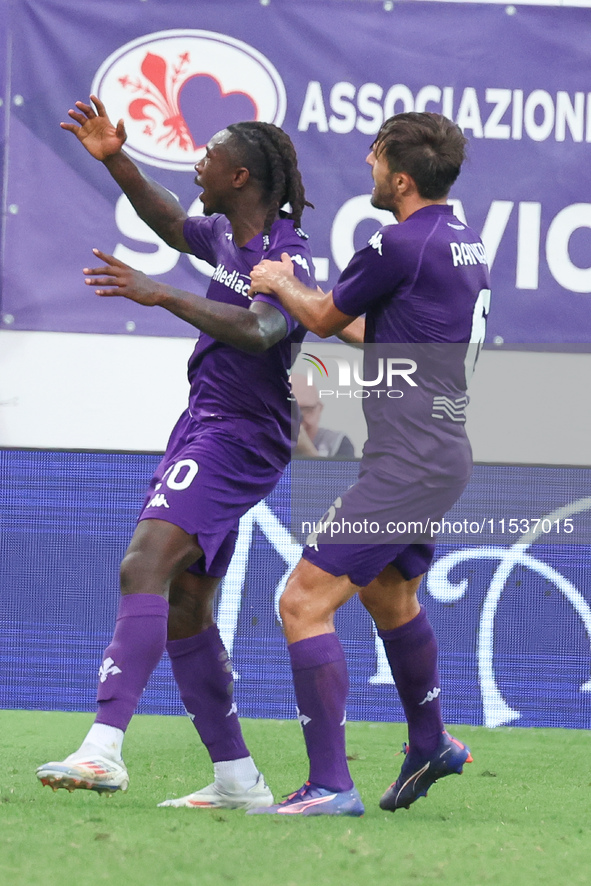 Moise Kean of ACF Fiorentina celebrates with teammates after scoring a goal during the Italian Serie A football match between ACF Fiorentina...