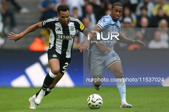 Newcastle United's Jacob Murphy breaks away from Tottenham Hotspur's Wilson Odobert during the Premier League match between Newcastle United...