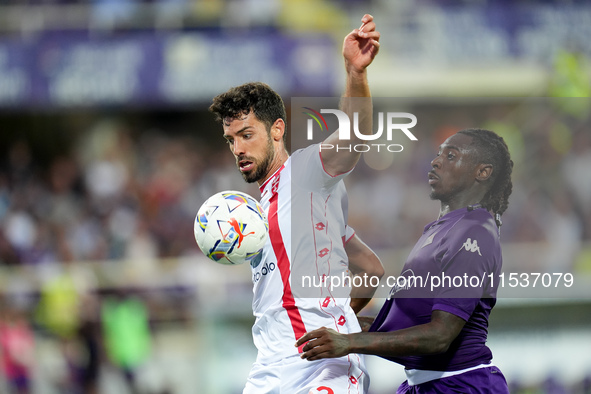 Moise Kean of ACF Fiorentina and Pablo Mari' of AC Monza compete for the ball during the Serie A Enilive match between ACF Fiorentina and AC...