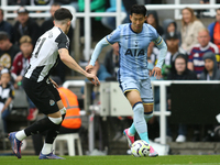 Tottenham Hotspur's Son Heung-Min takes on Newcastle United's Tino Livramento during the Premier League match between Newcastle United and T...