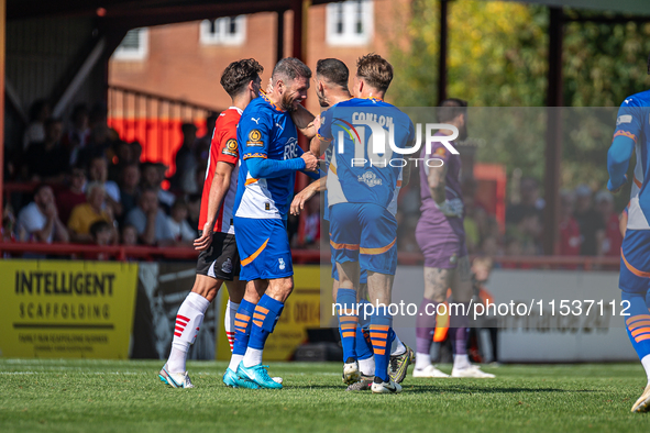 James Norwood celebrates scoring during the Vanarama National League match between Altrincham and Oldham Athletic at Moss Lane in Altrincham...