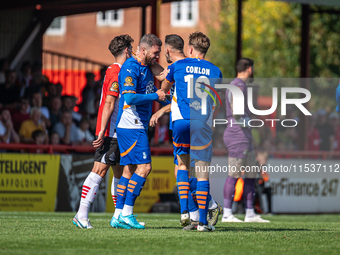 James Norwood celebrates scoring during the Vanarama National League match between Altrincham and Oldham Athletic at Moss Lane in Altrincham...