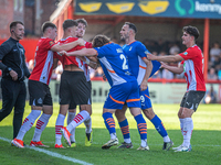 Oldham Athletic's Dan Gardner and Altrincham's Regan Linney battle during the Vanarama National League match between Altrincham and Oldham A...