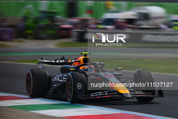 Sergio Perez of Red Bull Racing Honda drives his single-seater during the race of the Italian GP, the 16th round of the Formula 1 World Cham...