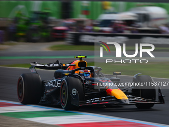 Sergio Perez of Red Bull Racing Honda drives his single-seater during the race of the Italian GP, the 16th round of the Formula 1 World Cham...