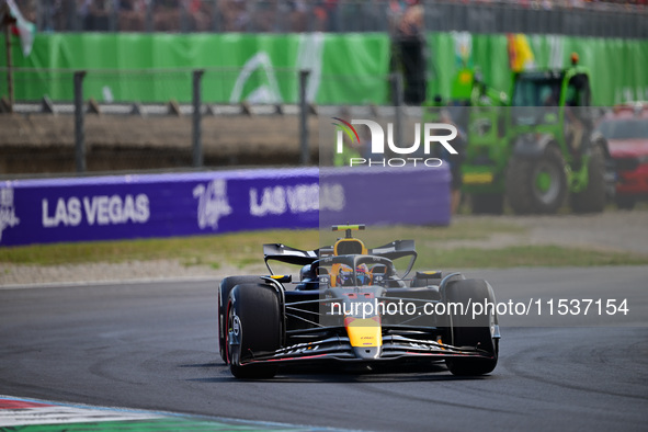 Sergio Perez of Red Bull Racing Honda drives his single-seater during the race of the Italian GP, the 16th round of the Formula 1 World Cham...