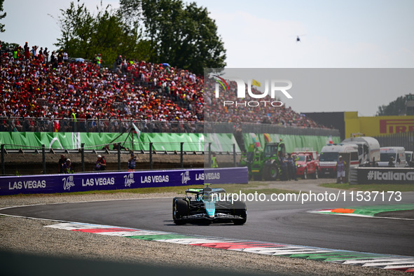 Fernando Alonso of Aston Martin Cognizant F1 Team drives his single-seater during the race of the Italian GP, the 16th round of the Formula...