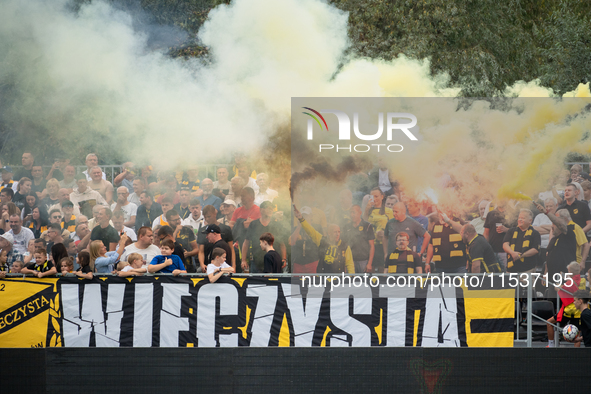 Wieczysta fans during the game between Wieczysta Krakow and Pogon Grodzisk Mazowiecki in Krakow, Poland, on September 1, 2024. Team supporte...