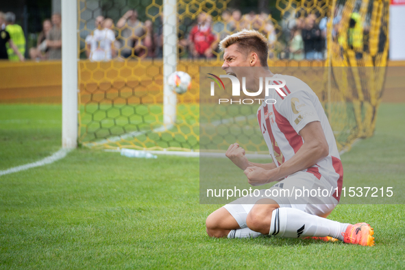 Kamil Odolak celebrates his team scoring a goal in a game between Wieczysta Krakow and Pogon Grodzisk Mazowiecki in Krakow, Poland, on Septe...