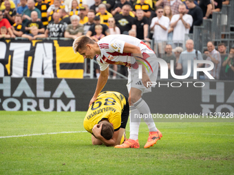 Daniel Mikolajewski and Kamil Odolak play in a game between Wieczysta Krakow and Pogon Grodzisk Mazowiecki in Krakow, Poland, on September 1...