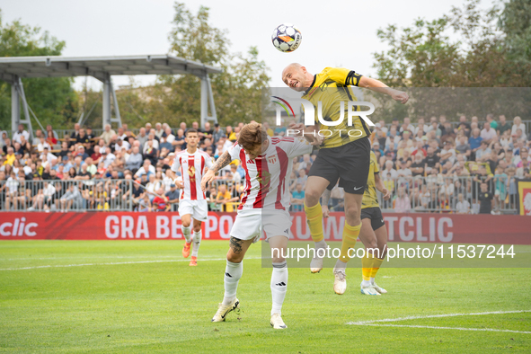 Michal Pazdan and Nikodem Niski play in a game between Wieczysta Krakow and Pogon Grodzisk Mazowiecki in Krakow, Poland, on September 1, 202...