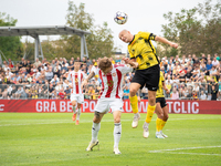 Michal Pazdan and Nikodem Niski play in a game between Wieczysta Krakow and Pogon Grodzisk Mazowiecki in Krakow, Poland, on September 1, 202...