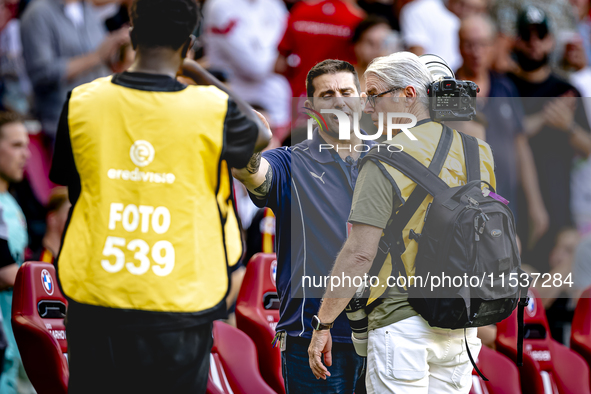 Photographer Peter van Gogh discusses with the security of PSV during the match PSV vs. Go Ahead Eagles at the Philips Stadium for the Dutch...